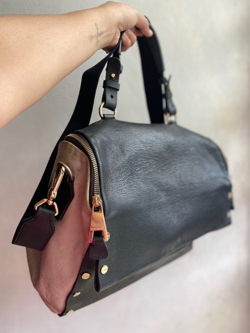 Authentic EMPORIO ARMANI (Category: Luxury Bags & Wallets) located in Manila. Submitted by thriftyhaven2023 (Listing ID 1399265460, Image 1). Description: Normal signs of usage only.