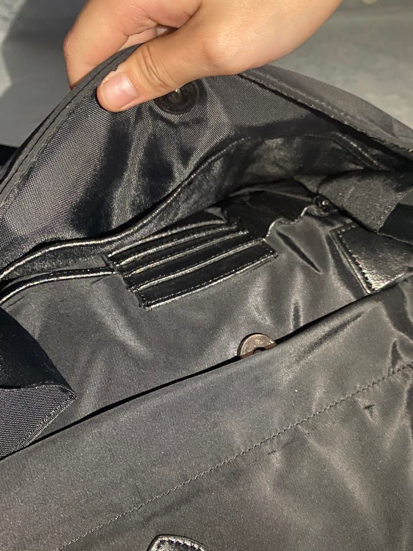 Black Travel Bag (Category: Luxury Bags & Wallets) located in Rizal. Submitted by protractor (Listing ID 1399335668, Image 2). Description: ⭐️ Pre-loved ⭐️ Large ⭐️ In Very Good condition Location: Taytay Rizal Payment: GCASH SF: shoulder by buyer Send a PM for more pictures and info! ✨Black travel bag ✨Includes handles and detachable shoulder strap ✨Classic design ✨Spacious interior ✨Features interior pockets.