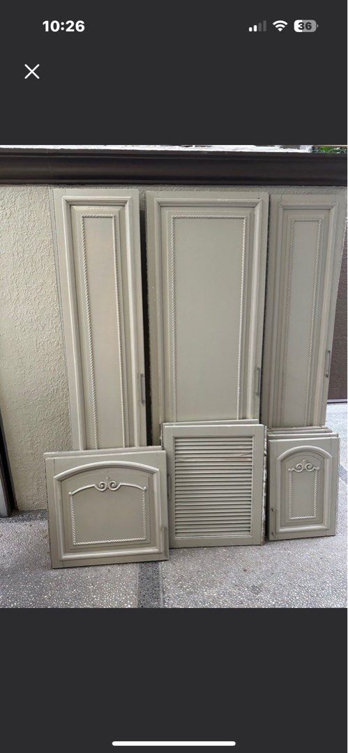 Cabinet Doors - Beige (Category: Shelves, Cabinets & Racks) located in Quezon City. Submitted by tinylee60 (Listing ID 1399443956, Image 1). Description: - Beige cabinet doors set - Includes various sizes and styles - Some doors feature decorative detailing and slatted design - Made of wood - Suitable for kitchen or storage cabinets - take all 2800.