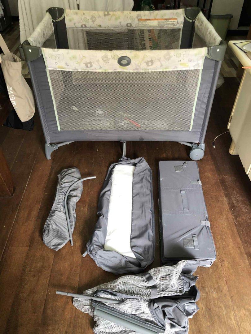 Crib/ playpen for sale (Category: Cots & Cribs) located in Manila. Submitted by maifrediah01041 (Listing ID 1399364715, Image 2). Description: Original GRACO crib/playpen Pre loved in very good condition 8/10 Walang punit or butas sa net Need wash kasi natambak. Complete set(pm for videos) 4,300php negotiable Baguio location Bpi/gcash for dropping.