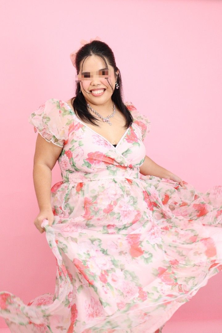 Floral Plus Size Dress/Gown (Category: Dresses) located in Silang. Submitted by itszeeee (Listing ID 1399324985, Image 2). Description: - Worn once for a birthday shoot - Beautiful floral maxi dress - Features a vibrant pink floral pattern - Elegant puff sleeves - Flowing, flattering skirt - Perfect for special occasions and photoshoots - Makes you feel special, like a birthday girl! - Great for parties and events.