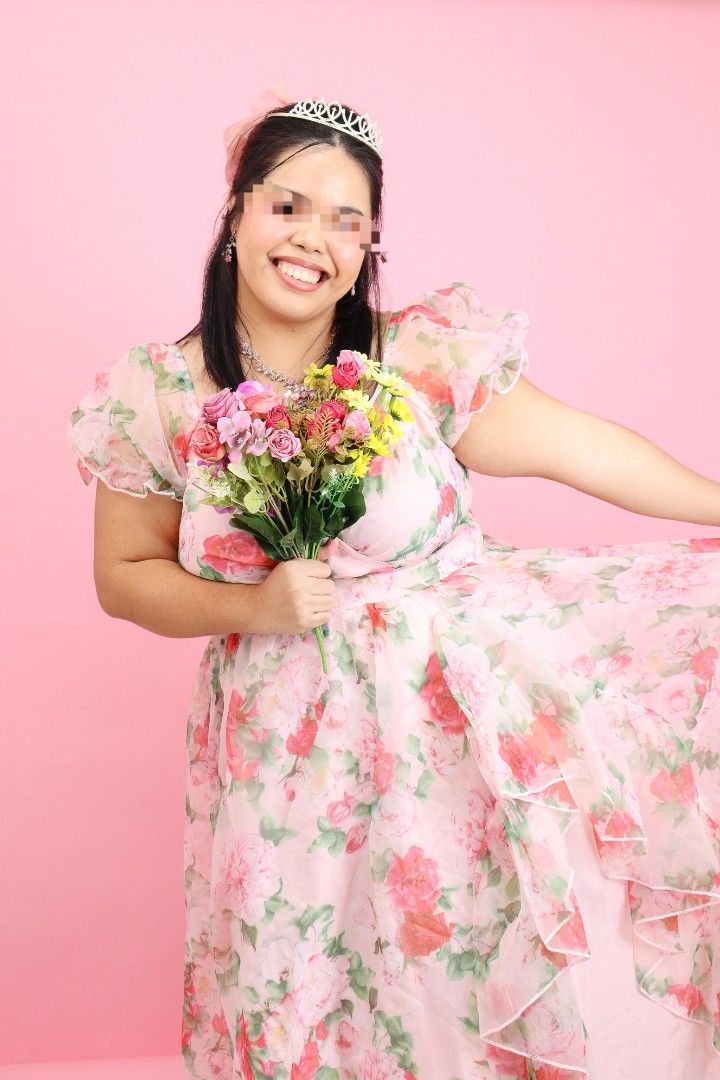 Floral Plus Size Dress/Gown (Category: Dresses) located in Silang. Submitted by itszeeee (Listing ID 1399324985, Image 1). Description: - Worn once for a birthday shoot - Beautiful floral maxi dress - Features a vibrant pink floral pattern - Elegant puff sleeves - Flowing, flattering skirt - Perfect for special occasions and photoshoots - Makes you feel special, like a birthday girl! - Great for parties and events.