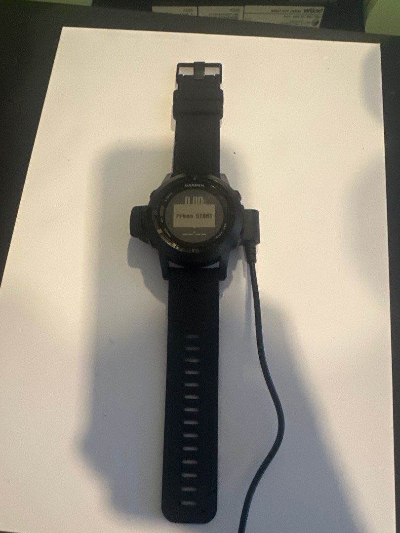 Garmin Smartwatch fenix 2 (Category: Wearables & Smart Watches) located in Manila. Submitted by ctpax (Listing ID 1399446288, Image 1). Description: - Garmin fenix 2 smartwatch - Black color - Includes charging cable - Round face - Black strap.