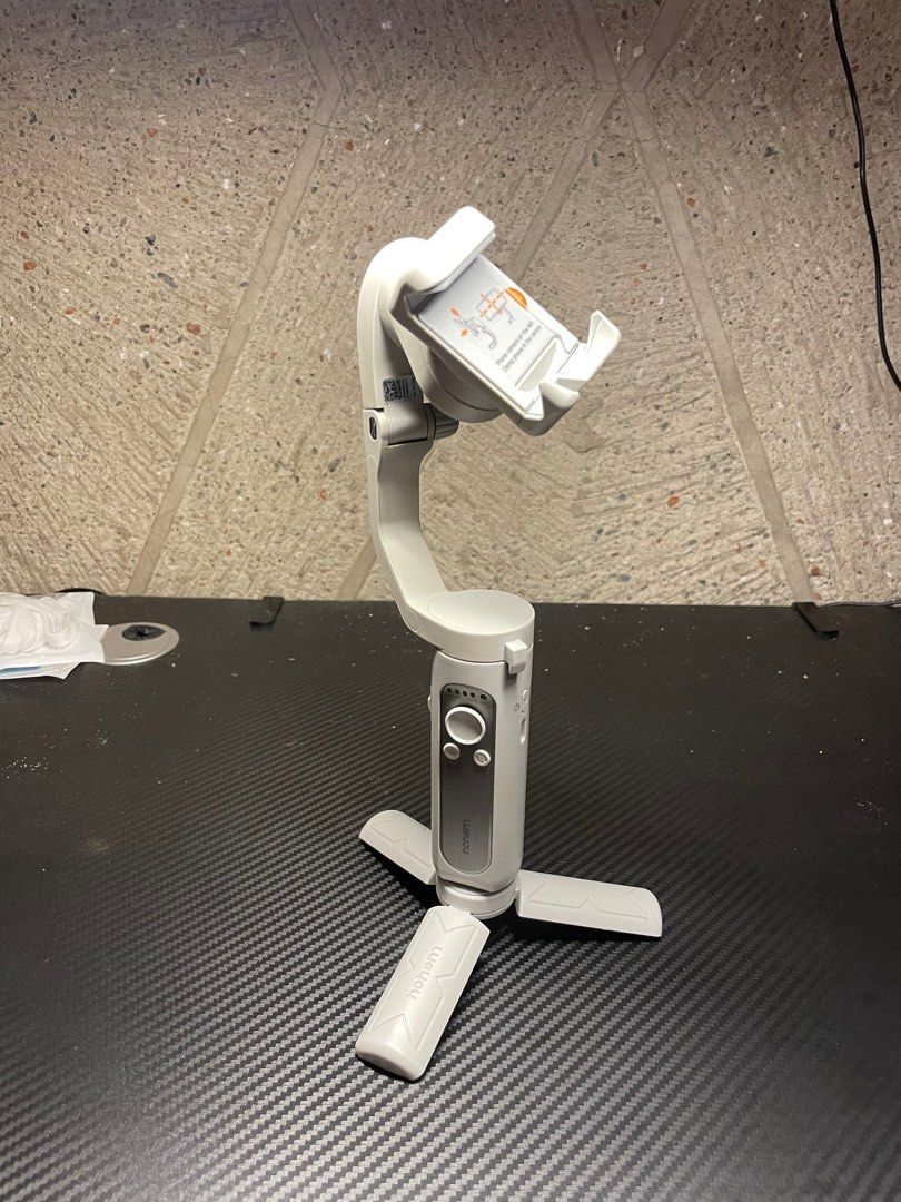 Hohem Smartphone Stabilizer | iSteady XE (Category: Mounts & Holders) located in Quezon City. Submitted by flyingwheatbread (Listing ID 1399383199, Image 3). Description: Hohem iSteady XE 3-Axis Smartphone Stabilizer Selling this intuitive stabilizer for 550 pesos less. Good as new! Masaya siya gamitin for mobile shoots and It's cheap with great quality features. Used for work a few times. • Grey Variant • Without Fill Light • USB-C to USB 2.0 ch