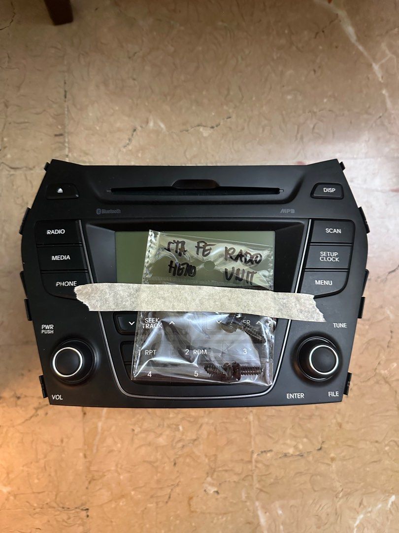 Hyundai Sta fe radio (Category: Audio, Video, Alarm and other Electronic Accessories) located in Quezon City. Submitted by lessp (Listing ID 1399421093, Image 1). Description: Old heavily used . .