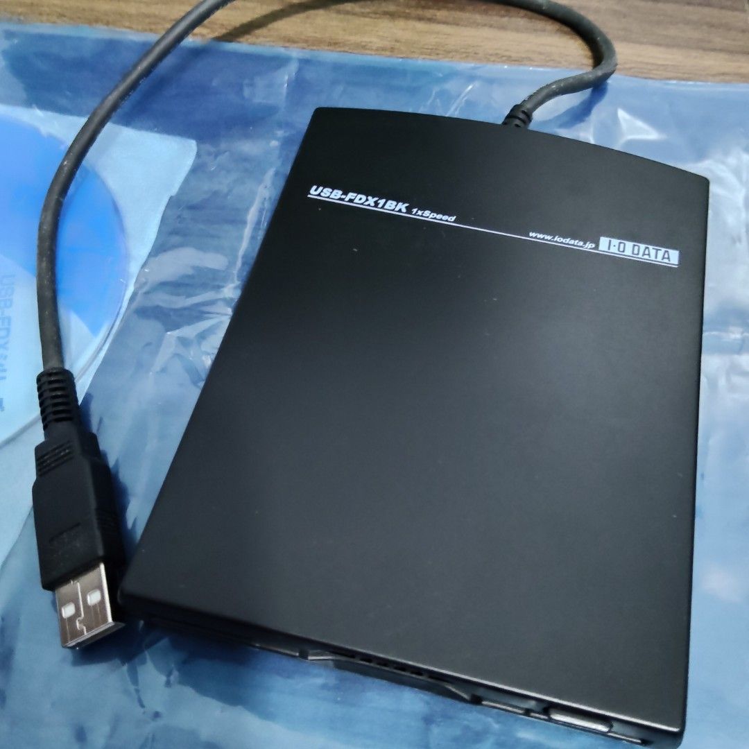I-O Data USB 2.0 Portable FDD (Category: Hard Disks & Thumbdrives) located in Catbalogan. Submitted by jpnsrpls (Listing ID 1399317674, Image 2). Description: - I-O Data USB Floppy Disk Drive - Model: USB-FDX1BK - Compatible with Windows and Macintosh - Includes USB cable and CD - Supports USB 2.0 Full-Speed & USB 1.1 - 7x speed.