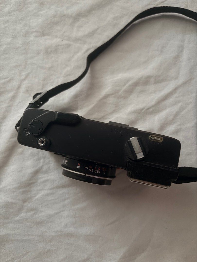 Konica C35 EF 35mm Film Camera (Category: Cameras) located in Valenzuela. Submitted by psycheg (Listing ID 1399303635, Image 3). Description: For Sale: Konica C35 EF – Classic 35mm Film Camera Price: ₱4,500 Capture vintage charm with this Konica C35 EF, a reliable and compact 35mm film camera perfect for beginners and enthusiasts alike. Details: • Classic 35mm film camera • Built-in flash (powered by 2x AA batteries – easy to find!) • Body condit