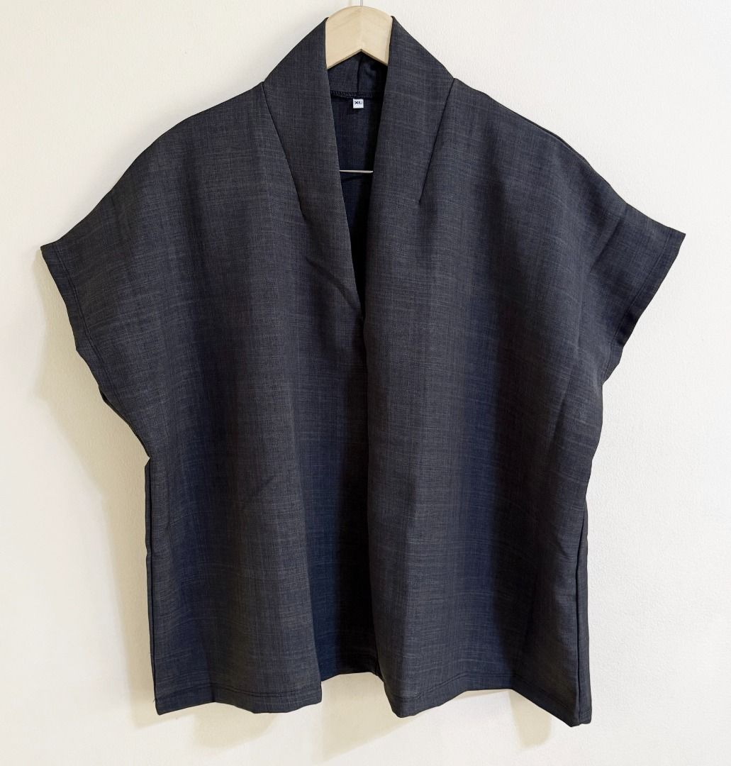 Koy Yada (Bangkok) dark gray top (Category: Blouses) located in Quezon City. Submitted by homestyleplus (Listing ID 1399358897, Image 1). Description: Koy Yada (Bangkok) dark gray top - Bought in Bangkok - size on tag: XL - chest: 42"-54" (approximate) - length: 27" (approximate) *color of item on photos may vary from its actual color due to editing/lighting ----- MOP: BPI / Gcash First to pay basis No COD, no rush shipping, no Sh0pee checkout - 
