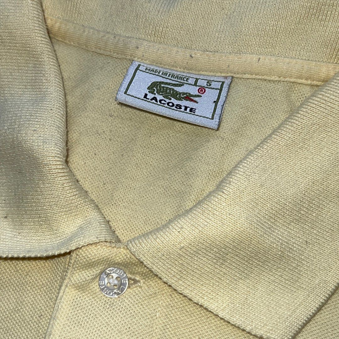 Lacoste Light Yello Polo Shirt (Category: Tshirts & Polo Shirts ) located in Pasig City. Submitted by johnmaxshop (Listing ID 1399412295, Image 2). Description: Lacoste Light Yello Polo Shirt Well used. May mga mantsa, I have no time to buy anti-mold spray, kaya yan. Also may himulmol P300 free shipping 💰Discount if buying more items. 📐 Measurements in inches Armpit to armpit or width- 22 Shoulder to hem or length - 29 Large to XL 📝 Reminders 