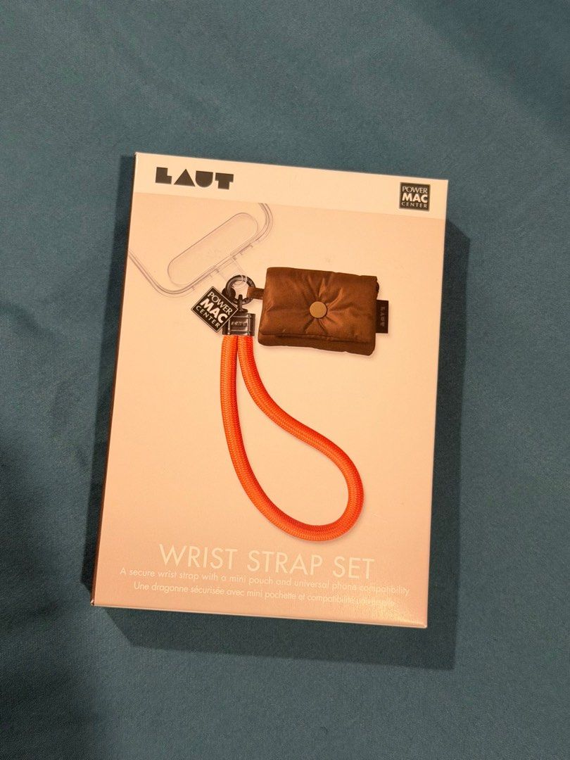 LAUT PMC x Wrist Strap Set with Puffer Bag (Category: Luxury Bags & Wallets) located in Rizal. Submitted by sedeba (Listing ID 1399343311, Image 1). Description: LAUT Wrist Strap Set includes a secure wrist strap with a mini pouch and universal phone compatibility. The set comes with a thick woven rope and a sturdy carabiner. The mini pouch offers a secure grip for your cash, keys, or earbuds within reach. The included universal hanger card makes