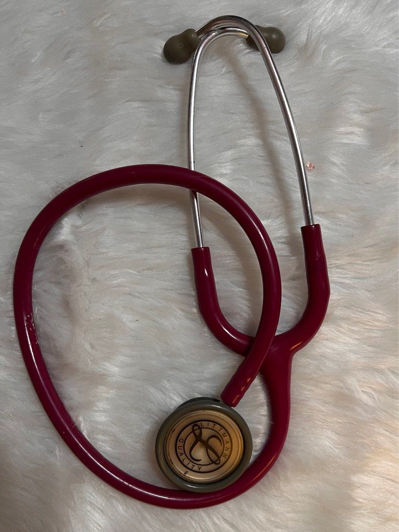 Littmann Classic II SE Stethoscope (Category: Medical Supplies & Tools) located in Lubao. Submitted by mioreecollection (Listing ID 1399362221, Image 2). Description: - Littmann Classic II SE stethoscope - Maroon color - Dual-sided chestpiece - Gray earpieces - Made in USA This is preloved items | No box | no other inclusions just the stethoscope alone please manage your expectations.