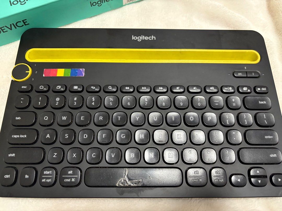 Logitech K480 Multi-Device Keyboard (Category: Computer Keyboard) located in Manila. Submitted by margottpen (Listing ID 1399389527, Image 3). Description: - Logitech K480 multi-device keyboard - Features a stylish yellow accent - Easy device switching with a dedicated dial - Includes the original box - Shows some wear and tear on the keys - Compact design - Connects to multiple devices NEGOTIABLE PRICE.