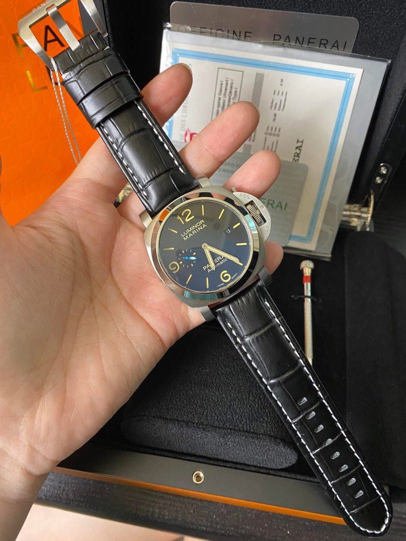 Luminor Marina Panerai Automatic Watch (Category: Men's Watches) located in Manila. Submitted by jessy0114 (Listing ID 1399292770, Image 1). Description: L- Panerai Luminor Marina watch - Black dial with luminous hands and markers - Visible movement on the back - Comes with a brown leather strap - Includes box and papers - Extra strap included - Strap adjustment tool included.