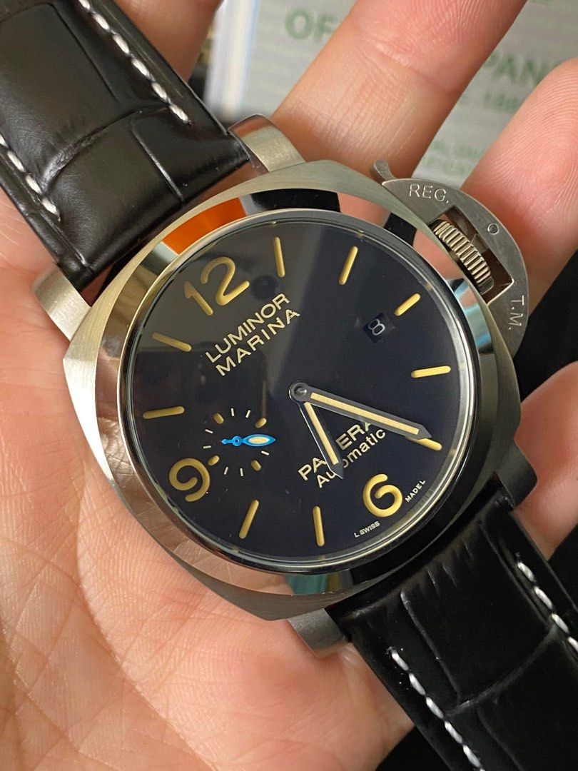 Luminor Marina Panerai Automatic Watch (Category: Men's Watches) located in Manila. Submitted by jessy0114 (Listing ID 1399292770, Image 3). Description: L- Panerai Luminor Marina watch - Black dial with luminous hands and markers - Visible movement on the back - Comes with a brown leather strap - Includes box and papers - Extra strap included - Strap adjustment tool included.