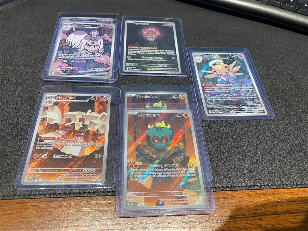 Mega Evolution IRs (Category: Raw Cards) located in Singapore. Submitted by cherylcohen (Listing ID 1399422610, Image 1). Description: Mega Evolution IRs Houndstone - 8 each (2 left) Garganacl - 4 SOLD Marshadow - 48 each (1 left) Spiritomb - 6 SOLD Shedinja - 8 SOLD.