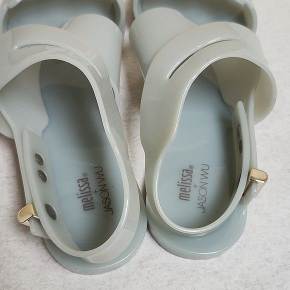 Melissa + Jason Wu Sandals size 5 (Category: Flats & Sandals) located in Bulacan. Submitted by tyablase (Listing ID 1399267203, Image 2). Description: - Melissa x Jason Wu collaboration - Light blue color - Unique strap design with gold accents - Melissa and Jason Wu branding on insole - Size 5 - Adds elegance to any outfit Actual Size 22 1/2 cm USA 5 Eur 35/36 size 5 ako nasa photos actual fitting npakaganda wla ng box pero npakabango pa.. Very 