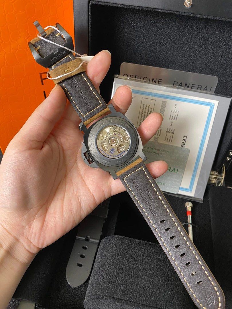 Panerai Luminor Marina Watch Automatic Complete (Category: Men's Watches) located in Manila. Submitted by jessy0114 (Listing ID 1399287839, Image 2). Description: - Panerai Luminor Marina watch - Black dial with luminous hands and markers - Visible movement on the back - Comes with a brown leather strap - Includes box and papers - Extra strap included - Strap adjustment tool included.