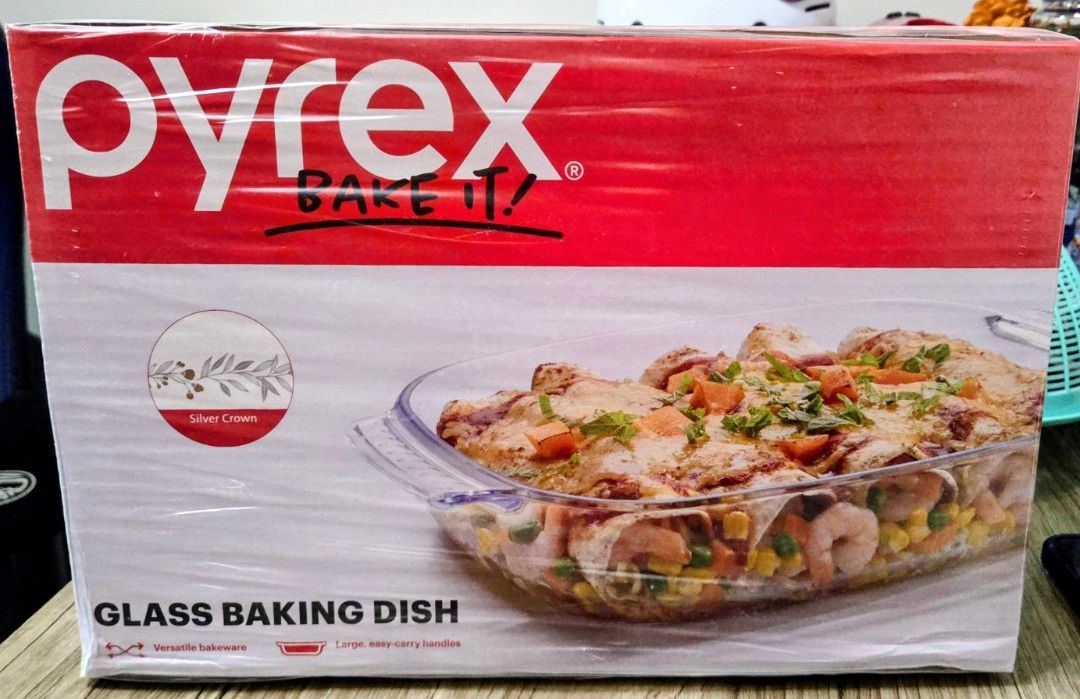 Pyrex 2PC Glass Baking Dish (Category: Bakeware) located in Manila. Submitted by sterling_grace (Listing ID 1399333251, Image 1). Description: - Pyrex glass baking dish(2L and 2.7L) - Clear glass design - Ideal for baking and serving - Easy-carry handles - Versatile for various dishes.