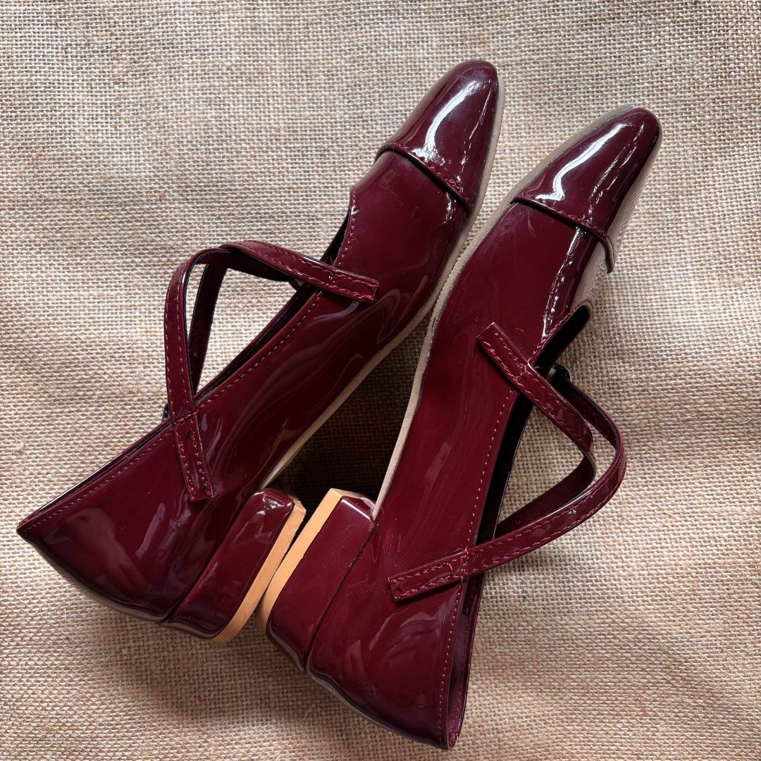 Red Patent Leather Mary Janes (Category: Heels) located in Mabalacat. Submitted by knh.aurelio (Listing ID 1399361868, Image 2). Description: - ❗₱50 SF FOR LUZON AREA❗ - Size 35 - bought for 600+ in orange app - straps are not movable (has garter, not hook&buckle) - minimal to no scuffing/scratches RFS: decluttering.