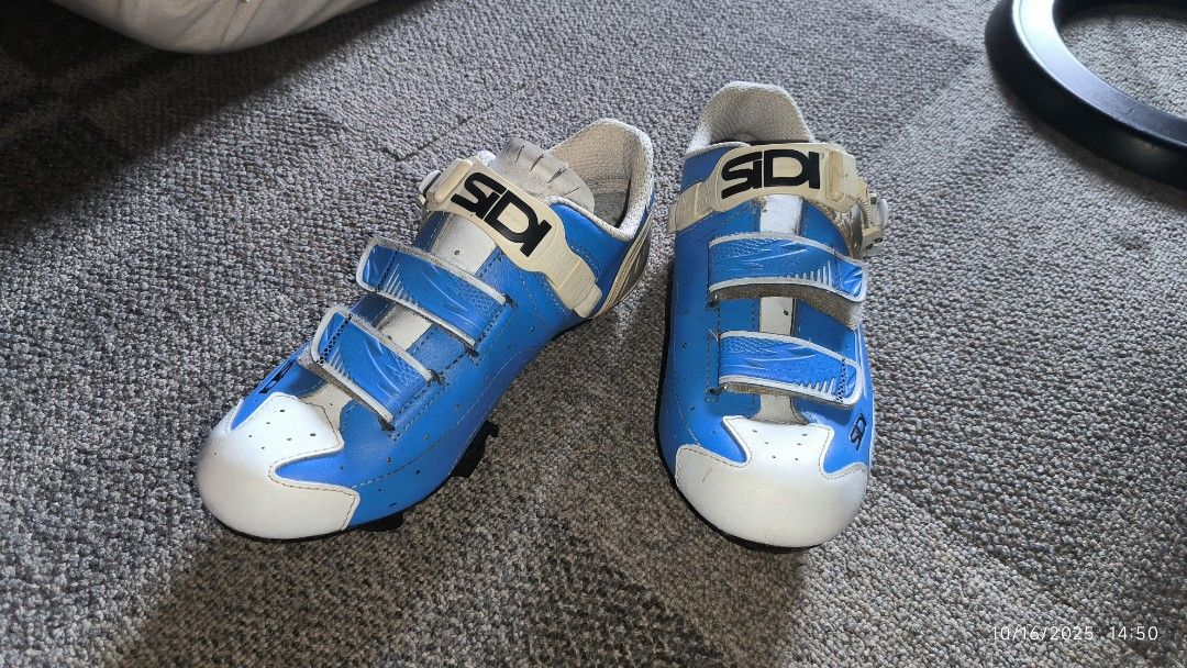 Sidi Cycling Shoes (Category: Bicycles) located in Quezon City. Submitted by picshot (Listing ID 1399279877, Image 1). Description: - Used size 42 roadbike shoes - Brand: Sidi cycling shoes - Color: Blue and White - Closure: Two velcro straps plus 1 ratchet system - Sole: Carbon sole with strengthening by side stitching - Insole: Sidi logo, "Made in Romania".