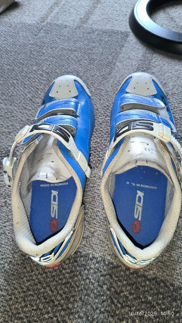 Sidi Cycling Shoes (Category: Bicycles) located in Quezon City. Submitted by picshot (Listing ID 1399279877, Image 2). Description: - Used size 42 roadbike shoes - Brand: Sidi cycling shoes - Color: Blue and White - Closure: Two velcro straps plus 1 ratchet system - Sole: Carbon sole with strengthening by side stitching - Insole: Sidi logo, "Made in Romania".