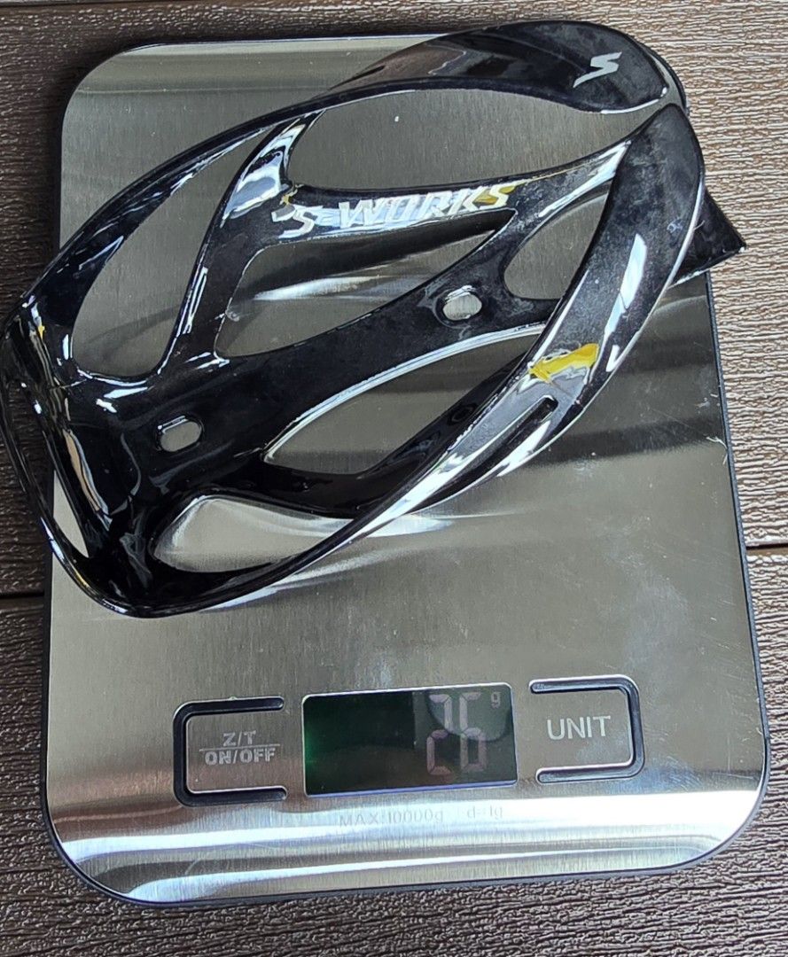 Specialized S-Works Bottle Cages (OEM) (Category: Parts & Accessories) located in Singapore. Submitted by r.o.g.e.r (Listing ID 1399280852, Image 3). Description: - Specialized S-Works bottle cages - Lightweight design - Weight: 26g per piece - Ideal for road or mountain bikes.