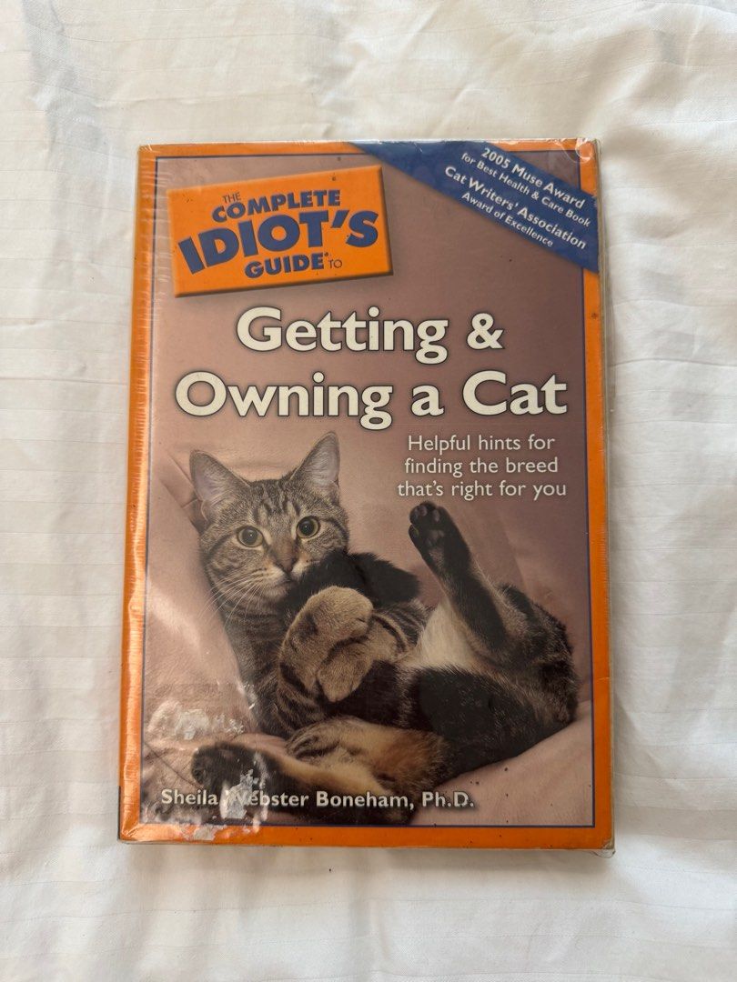 The Complete Idiot's Guide to Getting & Owning a Cat (Category: Storybooks) located in Paranaque City. Submitted by somegooodstuff (Listing ID 1399420388, Image 1). Description: - Find the purr-fect cat for you! - Learn how to cat-proof your home. - Understand your cat's behavior. - Get food and exercise recommendations. - Discover essential vaccination and vet advice. - It's all in "The Complete Idiot's Guide to Getting & Owning a Cat!".