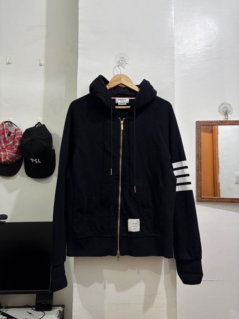 THOM BROWNE 4 BAR ZIP-UP HOODIE (Category: Coats, Jackets and Outerwear) located in Naga. Submitted by sislovesme (Listing ID 1399256933, Image 1). Description: •EXCELLENT CONDITION •NO FLAWS •RIRI UNZERZIP,DOUBLE ZIPPER FOR ENCHANCE STYLE LOOK •SIZE 3 •WIDTH 21 INCHES •LENGHT 27 INCHES.