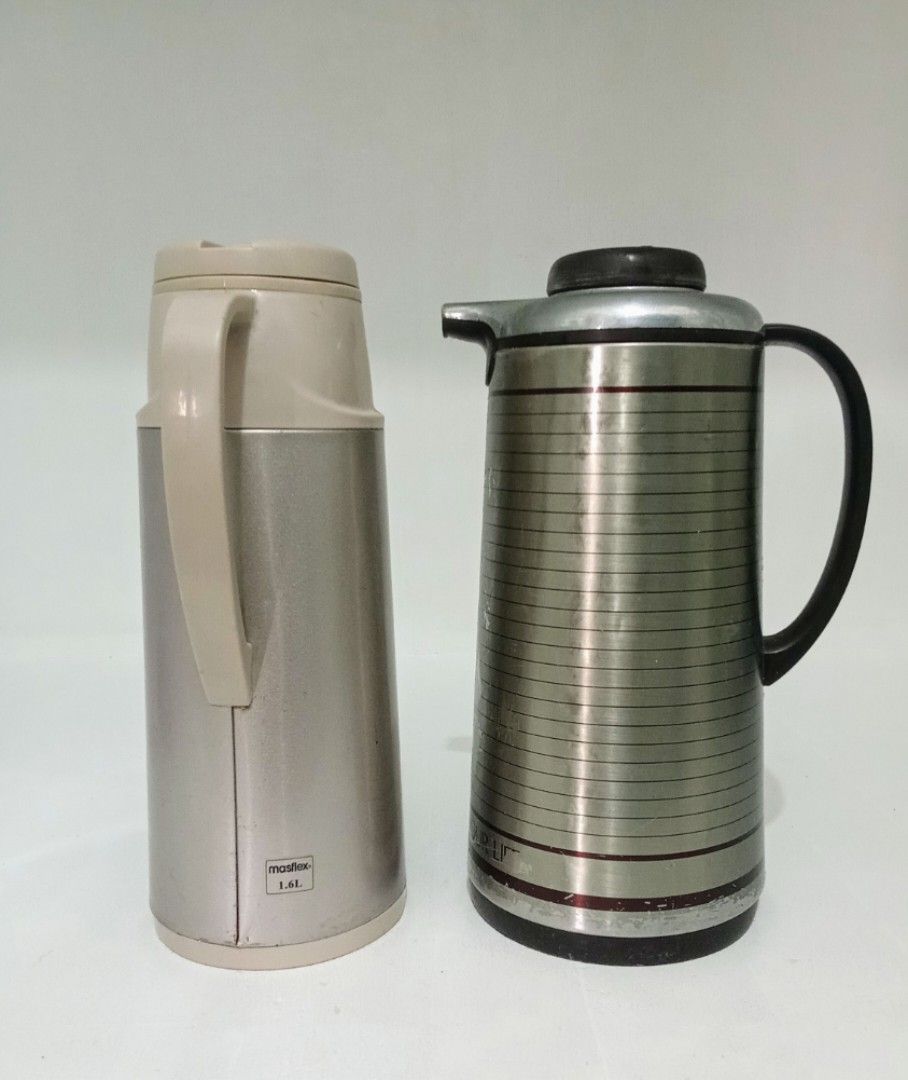 Tiger VACUUM THERMOS BUNDLE (Category: Pitchers & Dispensers) located in Manila. Submitted by eriiicaspage (Listing ID 1399283932, Image 2). Description: PREOWNED WellUsed Branded VACUUM THERMOS BUNDLE TIGER Japan brand thermos 1.9 L. Silver Satin ,Sign of Used ,Flaws , Nagfade un Printed Design . .Still Good to Use . Masflex Vacuum thermos ,Pink Metallic , 1.6L . Min Sign of Used ,NaStucked na lang. No oTher flaws .Good Condition . Rfs : for dec