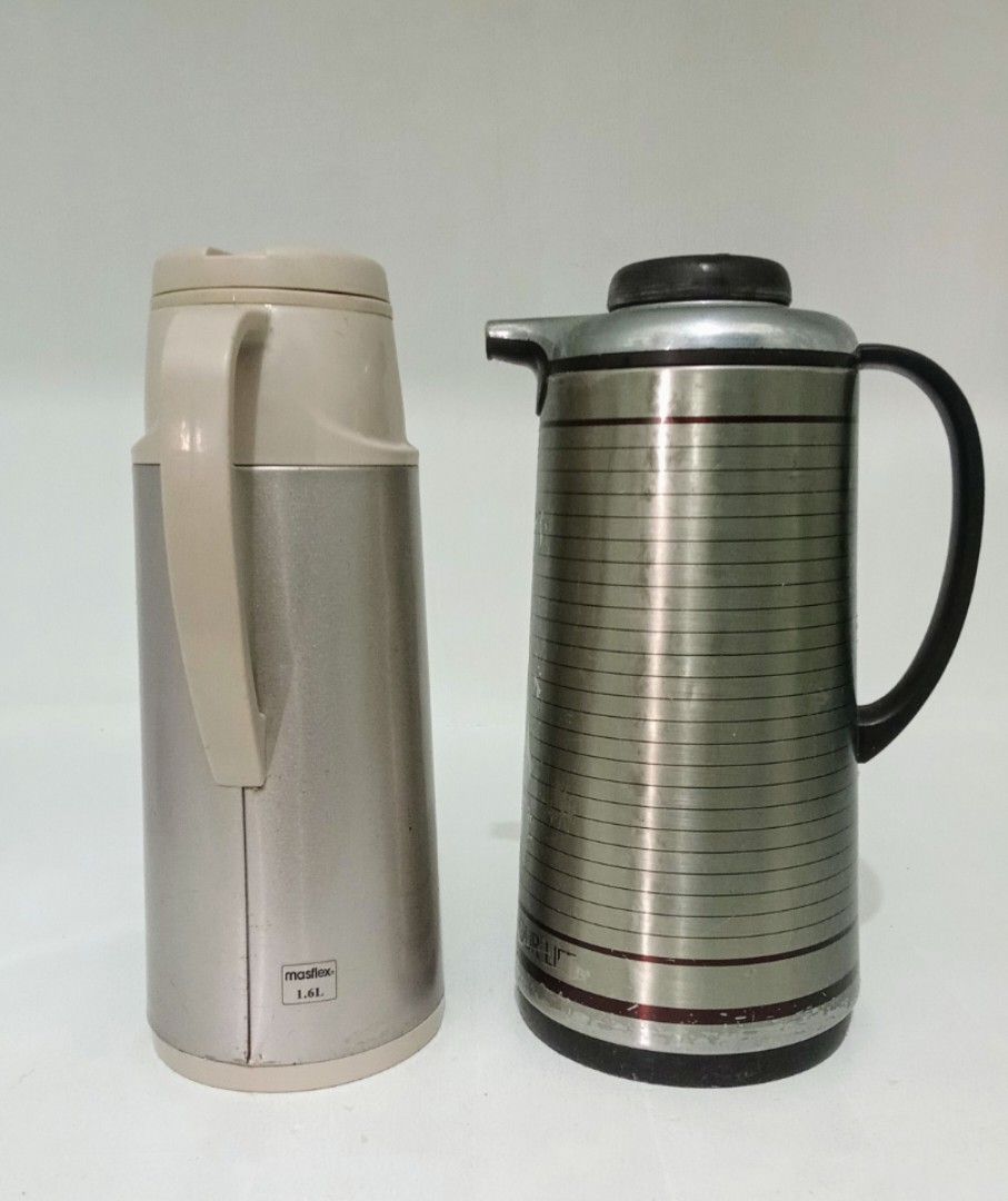 Tiger VACUUM THERMOS BUNDLE (Category: Pitchers & Dispensers) located in Manila. Submitted by eriiicaspage (Listing ID 1399283932, Image 3). Description: PREOWNED WellUsed Branded VACUUM THERMOS BUNDLE TIGER Japan brand thermos 1.9 L. Silver Satin ,Sign of Used ,Flaws , Nagfade un Printed Design . .Still Good to Use . Masflex Vacuum thermos ,Pink Metallic , 1.6L . Min Sign of Used ,NaStucked na lang. No oTher flaws .Good Condition . Rfs : for dec