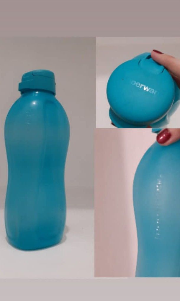 TUPPERWARE 2L WATER TUMBLER (Category: Water Bottles & Tumblers) located in Manila. Submitted by eriiicaspage (Listing ID 1399439288, Image 1). Description: PreOWNED LIGHTLY USED Authentic TUPPERWARE 2L WATER TUMBLER/BOTTLE Aqua blue 2L Min Sign of Used Good Condition 9/10.