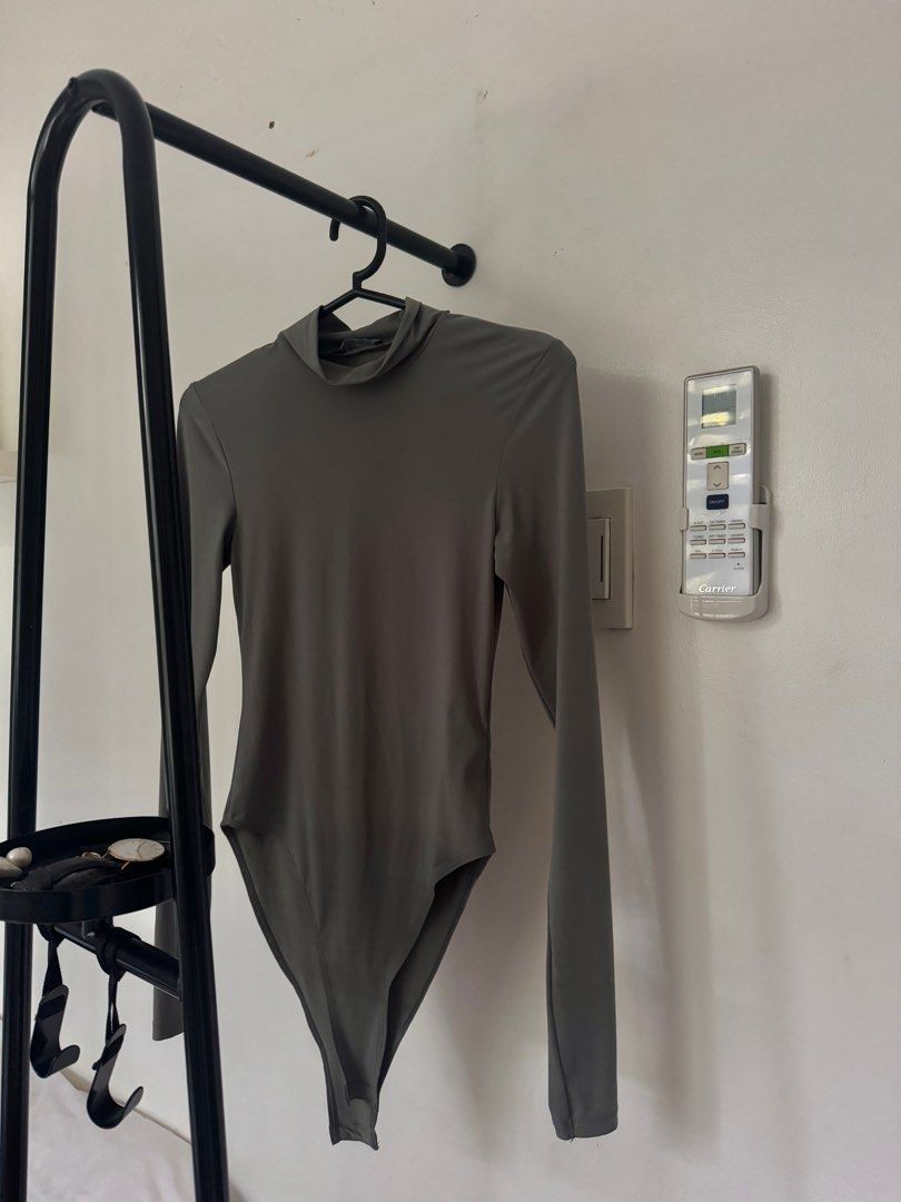 Zara Turtleneck Grey Bodysuit in Small (Category: Others Tops) located in Marikina City. Submitted by liveconsciously (Listing ID 1399351240, Image 3). Description: In excellent condition, lightly used (3x only). Price listed is final. Shipping fee c/o buyer. Height: 5’1 Waistline: 26” RFS: Decluttering.
