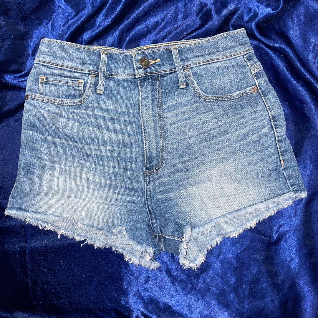 Abercrombie & Fitch Denim Shorts (Category: Shorts) located in Paranaque City. Submitted by eiiaaa (Listing ID 1399449459, Image 1). Description: - Abercrombie & Fitch denim shorts - Light wash - Size 4, fits waist 27 inches - Classic five-pocket design - Raw hem - Button and zipper closure - Abercrombie & Fitch logo on back - Made in New York.