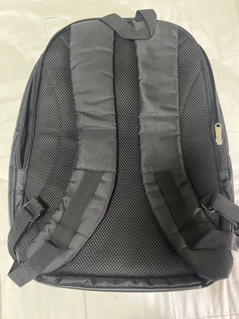 Acer Laptop Backpack (Category: Backpacks) located in Quezon City. Submitted by cristintin (Listing ID 1399449700, Image 3). Description: - Acer laptop backpack - Padded back for comfort - Adjustable straps - Multiple interior compartments - Durable black exterior - Features the Acer logo.