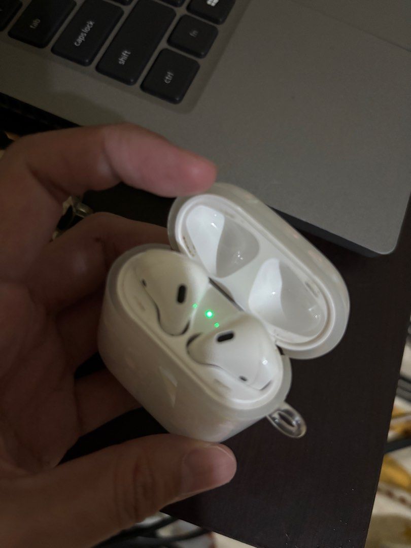Apple AirPods 2nd Gen with Case (Category: Earphones) located in Las Pinas. Submitted by theimpulsebuyer.ph (Listing ID 1399536448, Image 3). Description: guaranteed original. moneyback if proven fake. with lighting cable included. malinis pwede sa maarte. frequently cleaned and sanitized. 4500 take all last price. may stain lang sa takip part pero kaya naman matanggal if malinis. i have 2 available. issue: kulang ng isang airpod yung white. rfs.