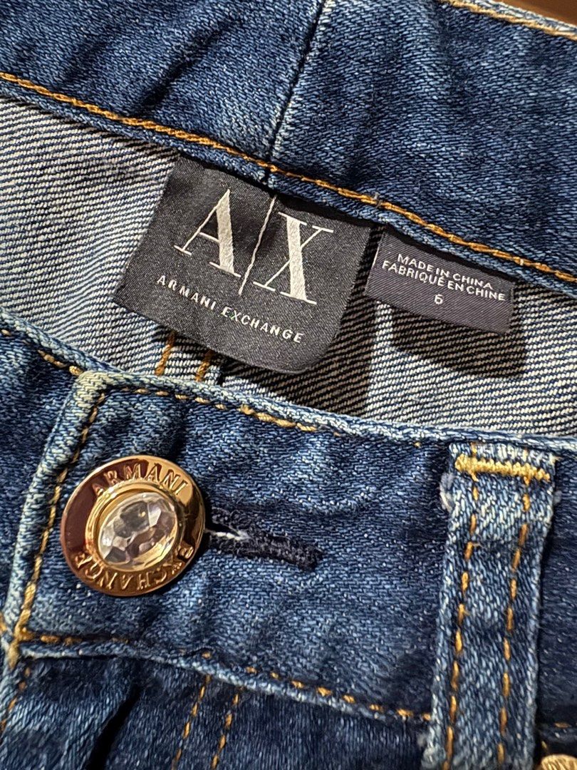 Armani Exchange (A/X) Skinny Jeans (Category: Jeans) located in Cainta. Submitted by clothesminded_ph (Listing ID 1399593196, Image 2). Description: - Size 6 but fits size 4 better (XS-S) - Can’t confirm its authenticity but saw a similar pair online in a diff color (please see last pic) - Bought 2nd hand, never worn upon purchase but washed Item description: - Dark denim, hand sand finishing - Crystal button - Gold hardware - Gold brand plate on