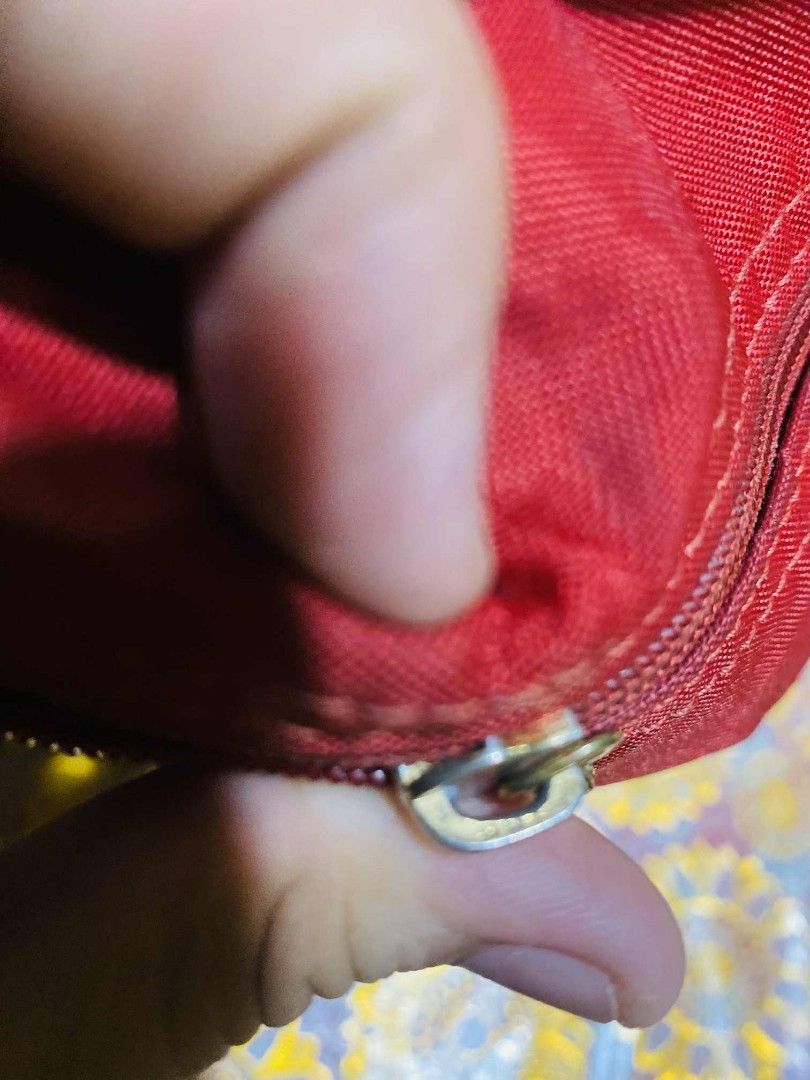Authentic Longchamp red backpack (Category: Luxury Bags & Wallets) located in San Isidro, Davao Oriental. Submitted by ranofrehets (Listing ID 1399589117, Image 3). Description: authentic Longchamp red P1, 000 SHIPPED Sign of usage MALINIS LOOB NO STAIN.