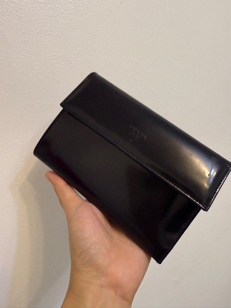 Authentic PRADA Trifold Wallet (Category: Luxury Bags & Wallets) located in Antipolo. Submitted by pinkescee (Listing ID 1399523437, Image 3). Description: Preloved simple and lowley prada wallet Trifold Great to use when travelling. Has a lot of pockets and the bill pocket is suitable for Yen or USD. No damage on corners With usual hairline scratches due to usage No smell. No peeling No inclusions Guaranteed authentic.