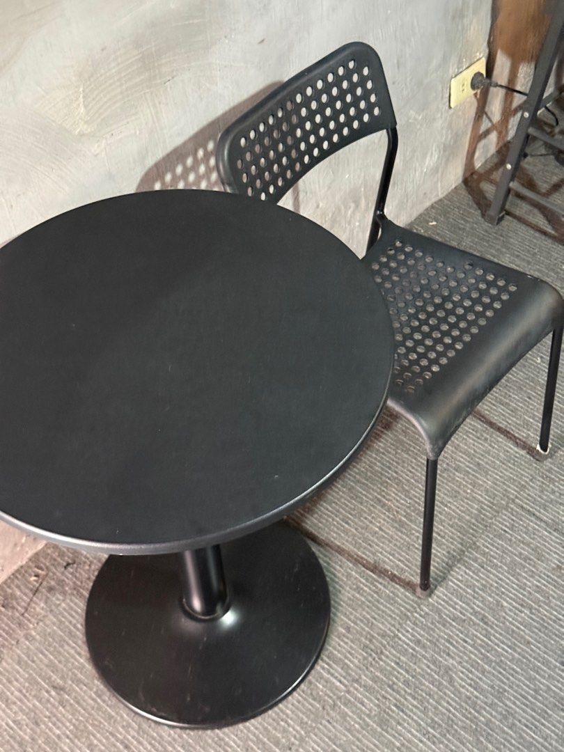 Black Round Table and Chair Set (Category: Tables & Sets) located in Paranaque City. Submitted by mrs_thrifty (Listing ID 1399506917, Image 2). Description: - Black round table with pedestal base. - Matching black chair with perforated backrest. - Modern and simple design. - Ideal for small spaces or cafe-style setup. Tulip table - 750 Ikea chair - 350 Slightly negotiable.