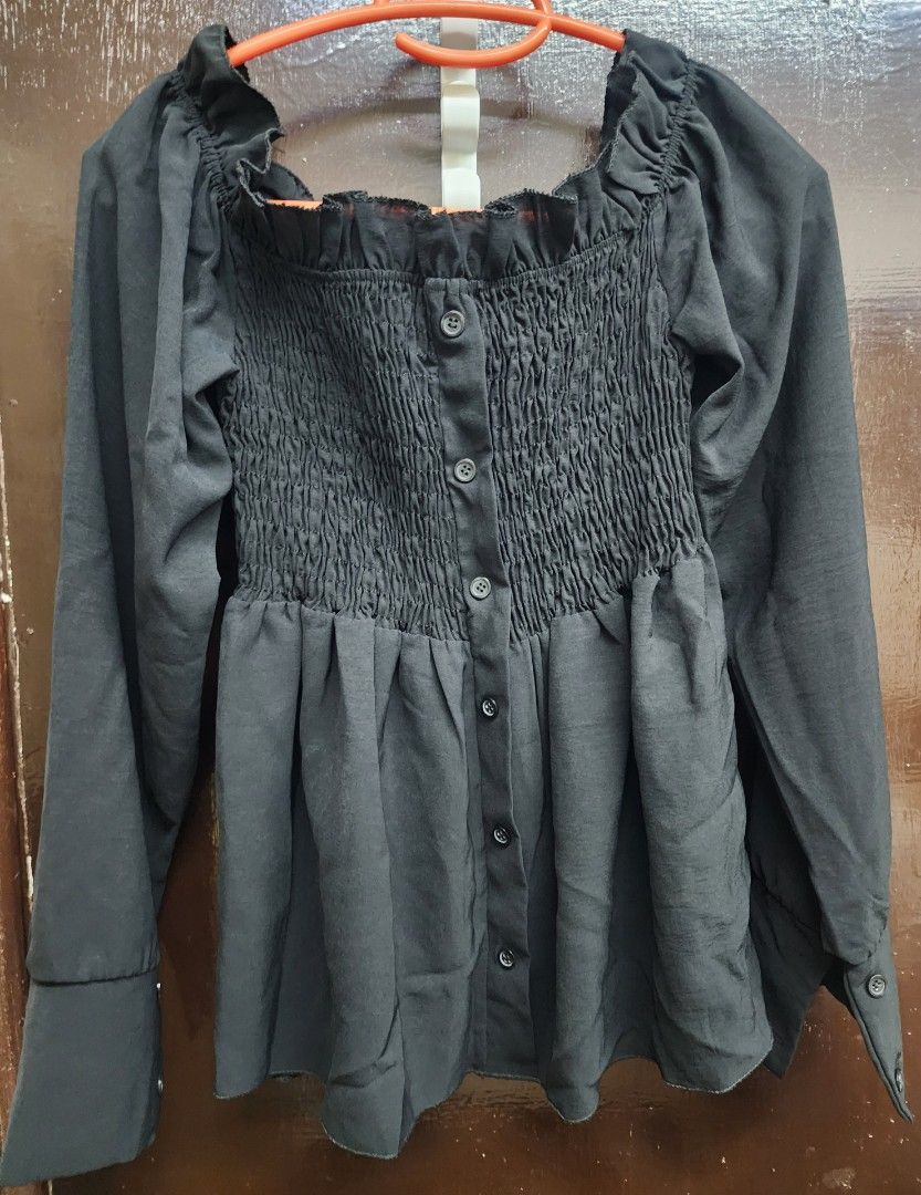 Black Smocked Blouse with Ruffle Neckline (Category: Blouses) located in Las Pinas. Submitted by yramerim (Listing ID 1399531640, Image 1). Description: Size: small to medium Mode of payment: Gcash,maya or rcbc Courier: LBC PLEASE MANAGE YOUR EXPECTATIONS. PRELOVED ITEMS NO CANCELLATION NO COD NO RETURN/NO EXCHANGE - Black blouse/off-shoulder - Square neckline with ruffle detail - Smocked bodice - Long sleeves with buttoned cuffs - Button-down fr
