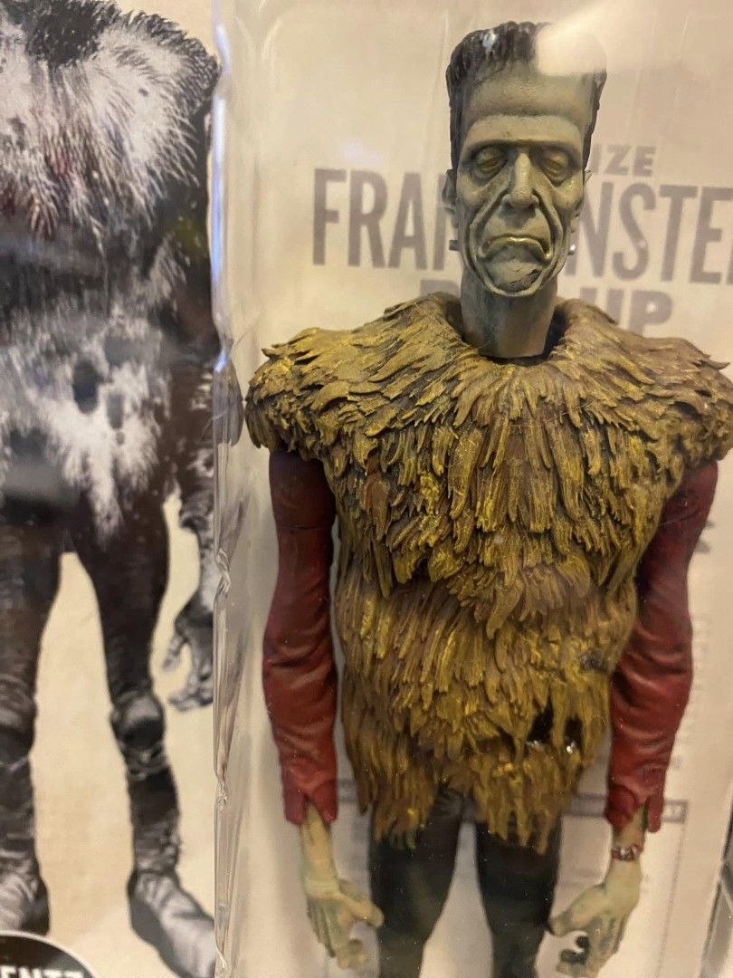 Brentz Dolz Jack Davis Frankenstein 8" Action Figure (Category: Figurines & Statues) located in Quezon City. Submitted by ritzrillo (Listing ID 1399552740, Image 3). Description: - Jack Davis Frankenstein action figure by Brentz Dolz. - Detailed design with green-skinned Frankenstein. - Features brown fur-like vest and red sleeves. - Includes backing card with vintage poster design. -Opened -Mini figures are for height comparison only -Mini figur