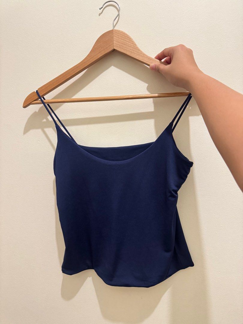 BSCO Navy Blue Tank Top (Category: Sleeveless) located in Quezon City. Submitted by monisea (Listing ID 1399586100, Image 1). Description: - Navy blue tank top from BSCO - Size: L - Features a square neckline and spaghetti straps - Made in the Philippines - Smooth fabric - Deep navy color - Perfect for layering or wearing alone - Never used RFS: wrong size :( .