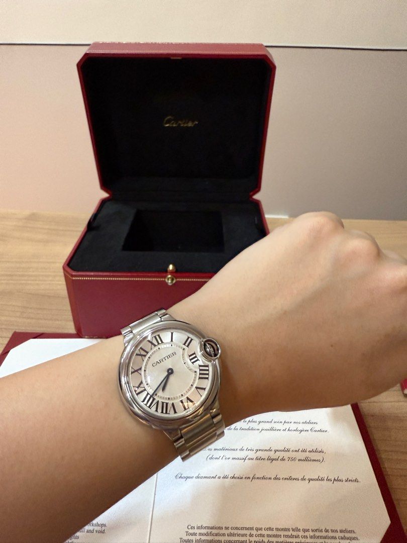 Cartier Ballon Bleu 36mm (Category: Luxury Watches) located in Pasig City. Submitted by simplydadar (Listing ID 1399568559, Image 1). Description: Authentic Cartier Ballon Bleu 36mm - Silver dial with Roman numeral hour markers - Stainless steel bracelet - Includes original box and papers - Comes with extra links Note: Registered in Cartier Website .