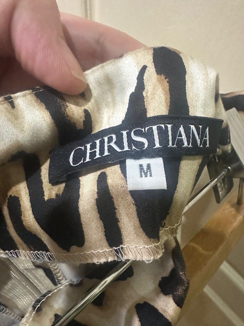 Christiana Leopard Print Skirt - Size M (Category: Skirts) located in Quezon City. Submitted by eycheng (Listing ID 1399541349, Image 3). Description: - Christiana leopard print skirt - Pencil skirt design - Size: M - Back zipper closure - Color palette: Black, brown, and white spots Waist 30” Length 27” Payment via bdo, bpi or gcash Buyer shoulders shipping .