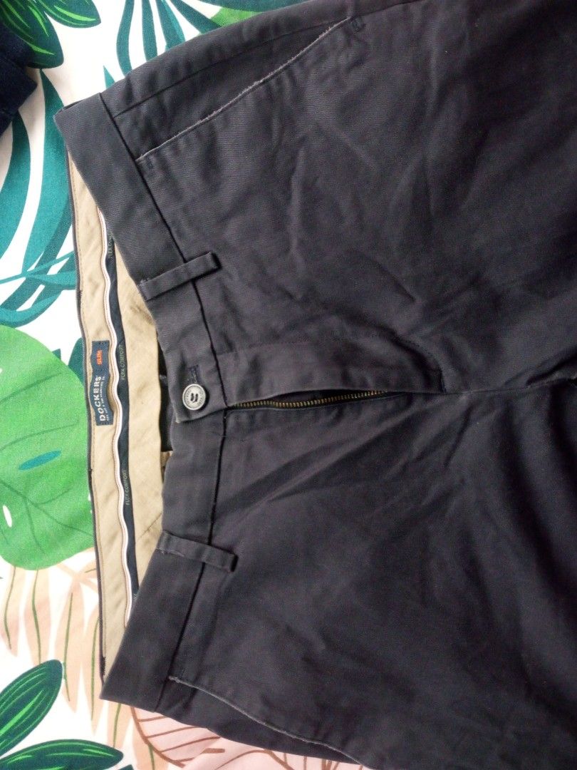 Dockers Navy Blue Pants (Category: Trousers) located in Porac. Submitted by themightythrift (Listing ID 1399532365, Image 3). Description: - Navy blue Dockers pants - Button and zipper closure - Two back pockets with button closures - Two front pockets - Belt loops - Cotton blend fabric - Versatile style.
