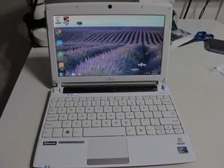 Fujitsu MH330 Netbook with Windows 7 home premium SP1 including charger and protective case64243047072387110