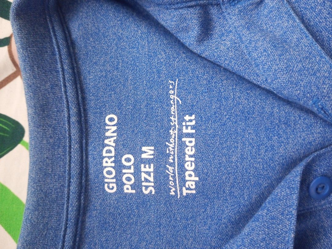 Giordano Polo Shirt - Size M (Category: Tshirts & Polo Shirts ) located in Porac. Submitted by themightythrift (Listing ID 1399532369, Image 2). Description: - Giordano polo shirt - Color: Blue - Size: M - Fit: Tapered - Features: Collared neckline, button closure, short sleeves, small chest logo - Material: Lightweight - Ideal for casual wear.