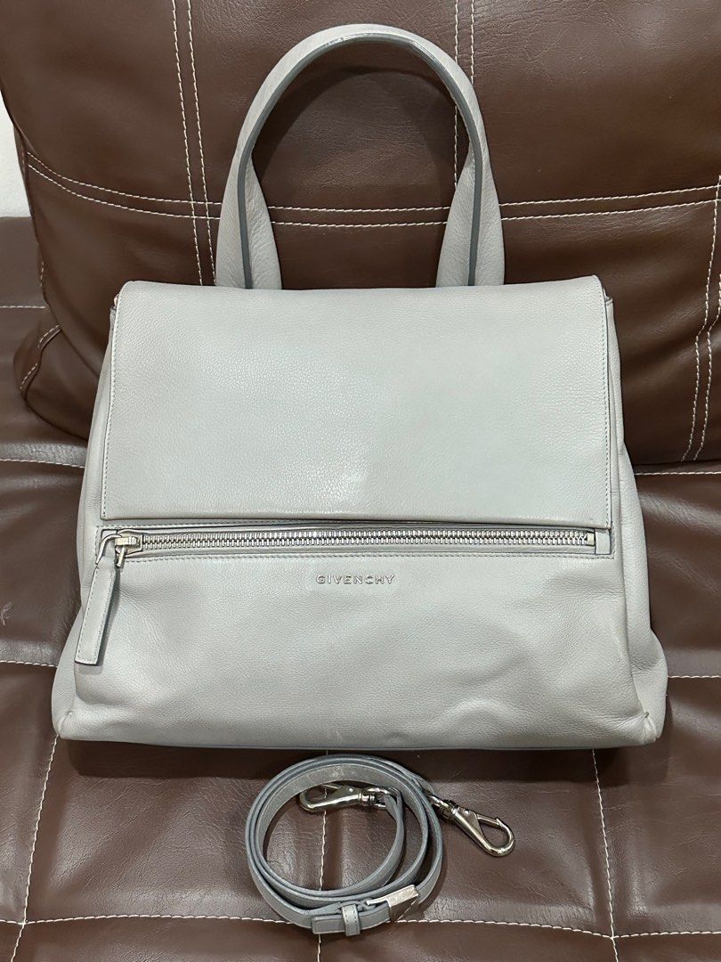 Authentic Givenchy bag (Category: Luxury Bags & Wallets) located in Quezon City. Submitted by hpyubzaj (Listing ID 1399484236, Image 1). Description: Selling for a friend who needs funds for her medical expenses GIVENCHY Medium Pandora Pure Bag 💯% Authentic 💯 % Calf Skin (leather) Light gray color - VGUC - some signs of usage - no other inclusions - only the bag, strap, and care card ✅ feel free to send me a reasonable price offer Location: Sco