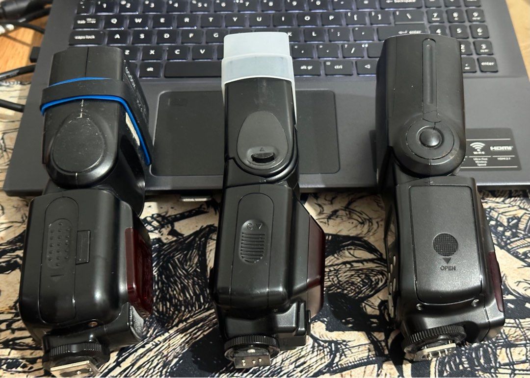 Godox, Nikon, and Yongnuo Camera Flashes (Category: Cameras) located in Malabon City. Submitted by reyyyyyyyyyyyyyyy (Listing ID 1399619450, Image 3). Description: - Includes three camera flashes: Godox, Nikon, and Yongnuo. - All flashes have hot shoe mounts. - Each flash has an LCD screen and setting buttons. For sale Nikon SB-24, Godox TT600 and YN565EX III Nikon SB-24 -Good working condition -Still working -With diffuser -TTL NO ISSUE Godox TT