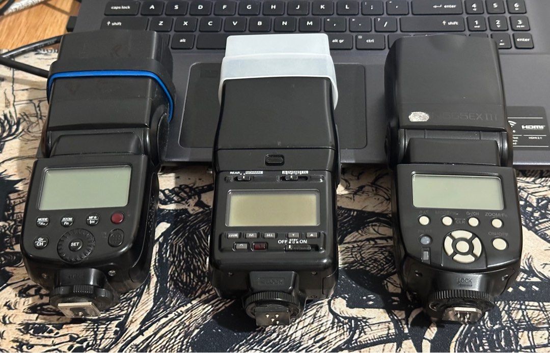 Godox, Nikon, and Yongnuo Camera Flashes (Category: Cameras) located in Malabon City. Submitted by reyyyyyyyyyyyyyyy (Listing ID 1399619450, Image 2). Description: - Includes three camera flashes: Godox, Nikon, and Yongnuo. - All flashes have hot shoe mounts. - Each flash has an LCD screen and setting buttons. For sale Nikon SB-24, Godox TT600 and YN565EX III Nikon SB-24 -Good working condition -Still working -With diffuser -TTL NO ISSUE Godox TT